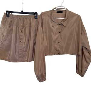 PrettyLittleThing Tan Mini Skirt Chic Design size 10